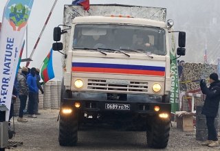Two trucks of Russian peacekeepers pass freely along Azerbaijan's Lachin-Khankendi road