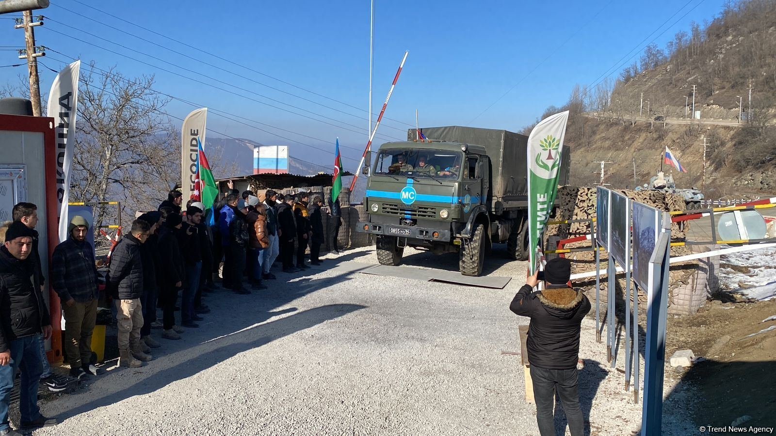 Another truck of Russian peacekeepers passes freely along Azerbaijan's Lachin-Khankendi road