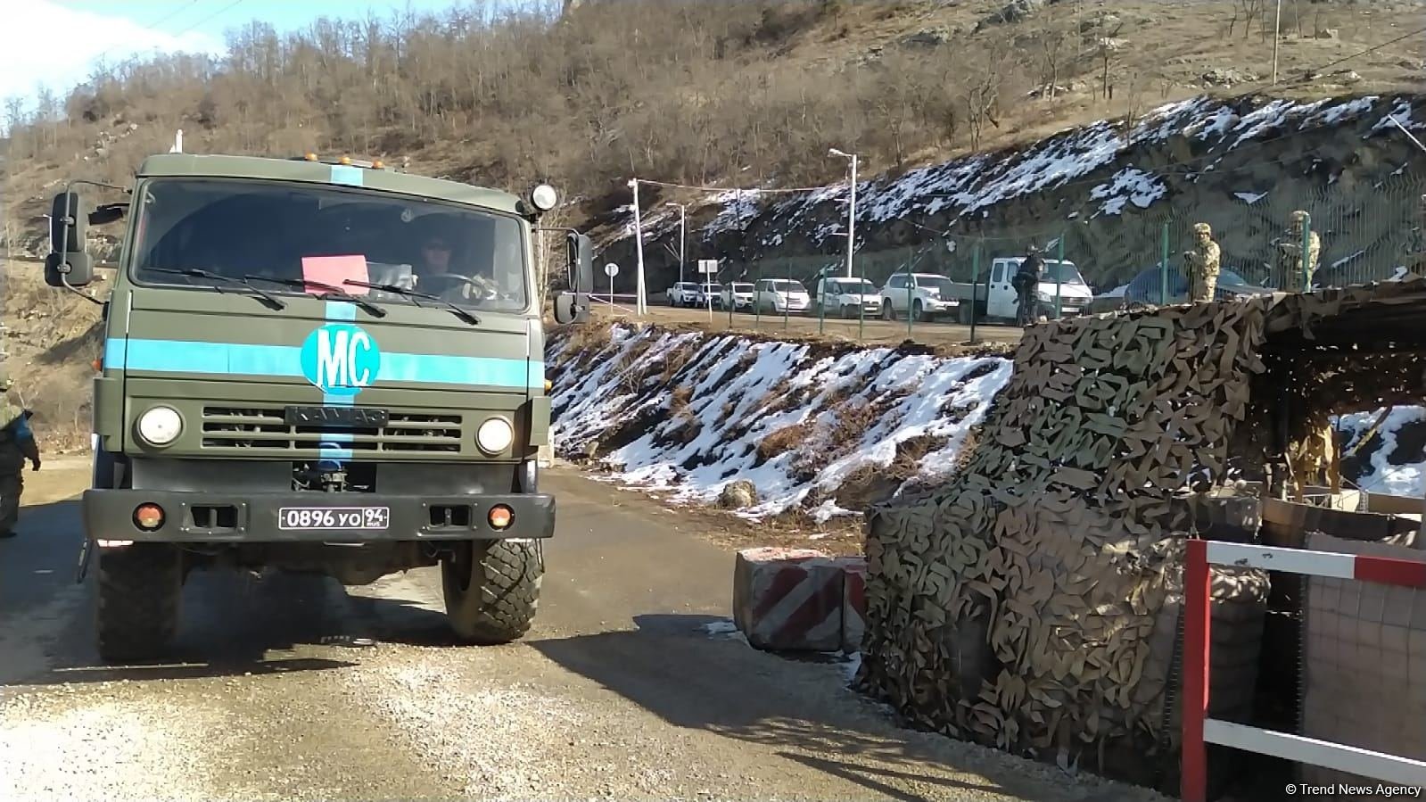 Trucks of Russian peacekeepers move along Azerbaijan's Lachin-Khankendi road